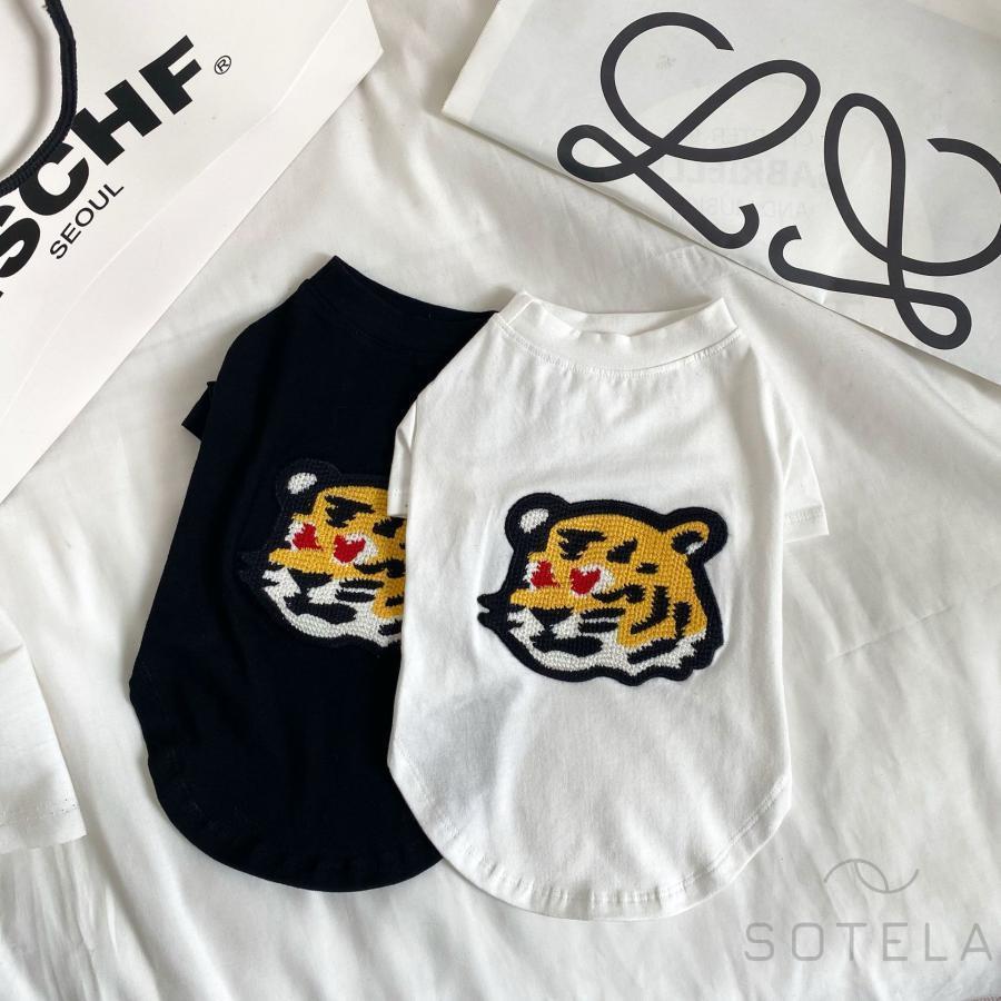 涼しげなコットンTシャツ。トラ柄のワンポイント刺繍がかわいい。クーラーが苦手なわんちゃんにも是非。換毛期の抜け毛予防にも。パジャマにもタイガースファンの飼い主様必見！素材 コットンサイズL 首回り２４